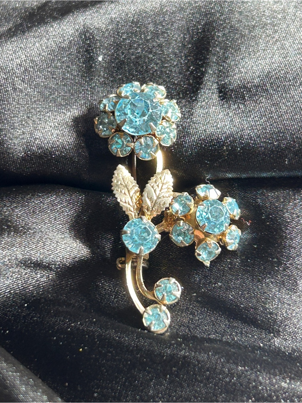 Vintage Gold-Tone Floral Brooch with Bright Blue Crystals